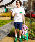 Max walking outside with our durable tote bags